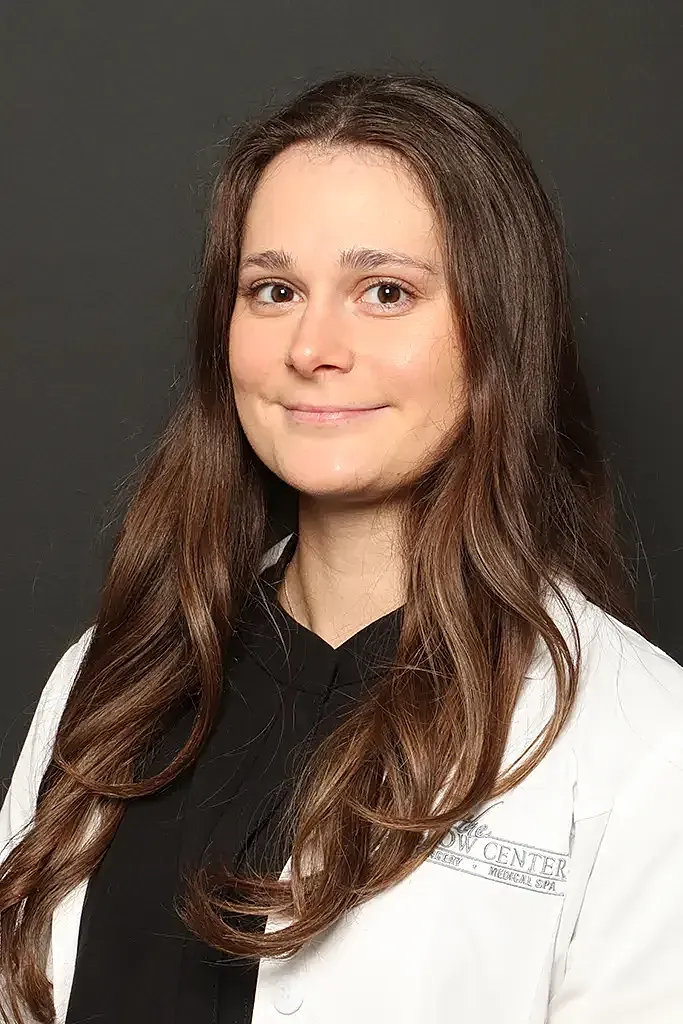 Professional woman in a lab coat portrait.