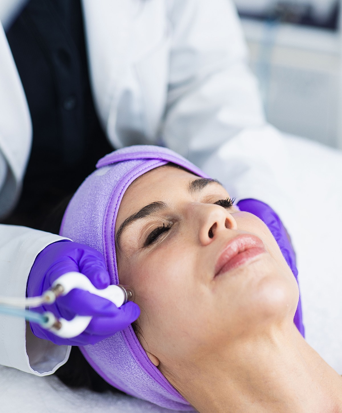 Facial treatment in a skincare clinic setting.