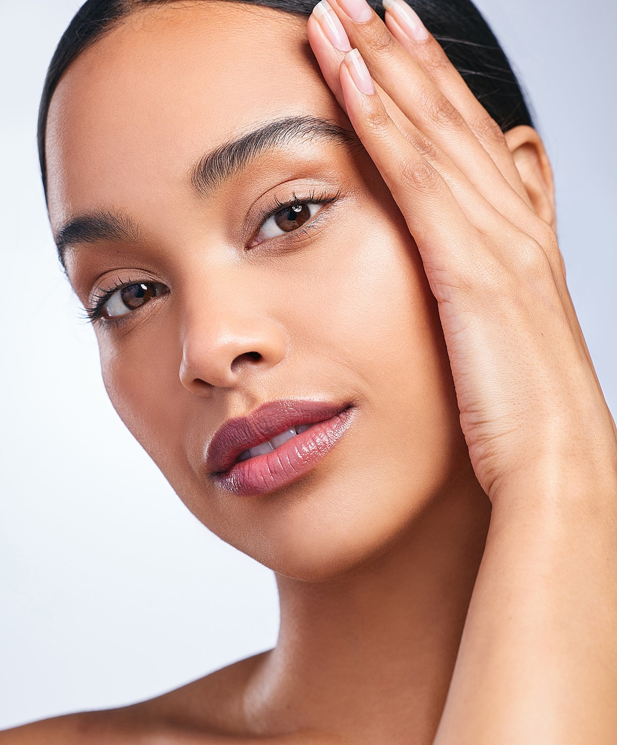 Close-up of a woman's face with natural beauty.