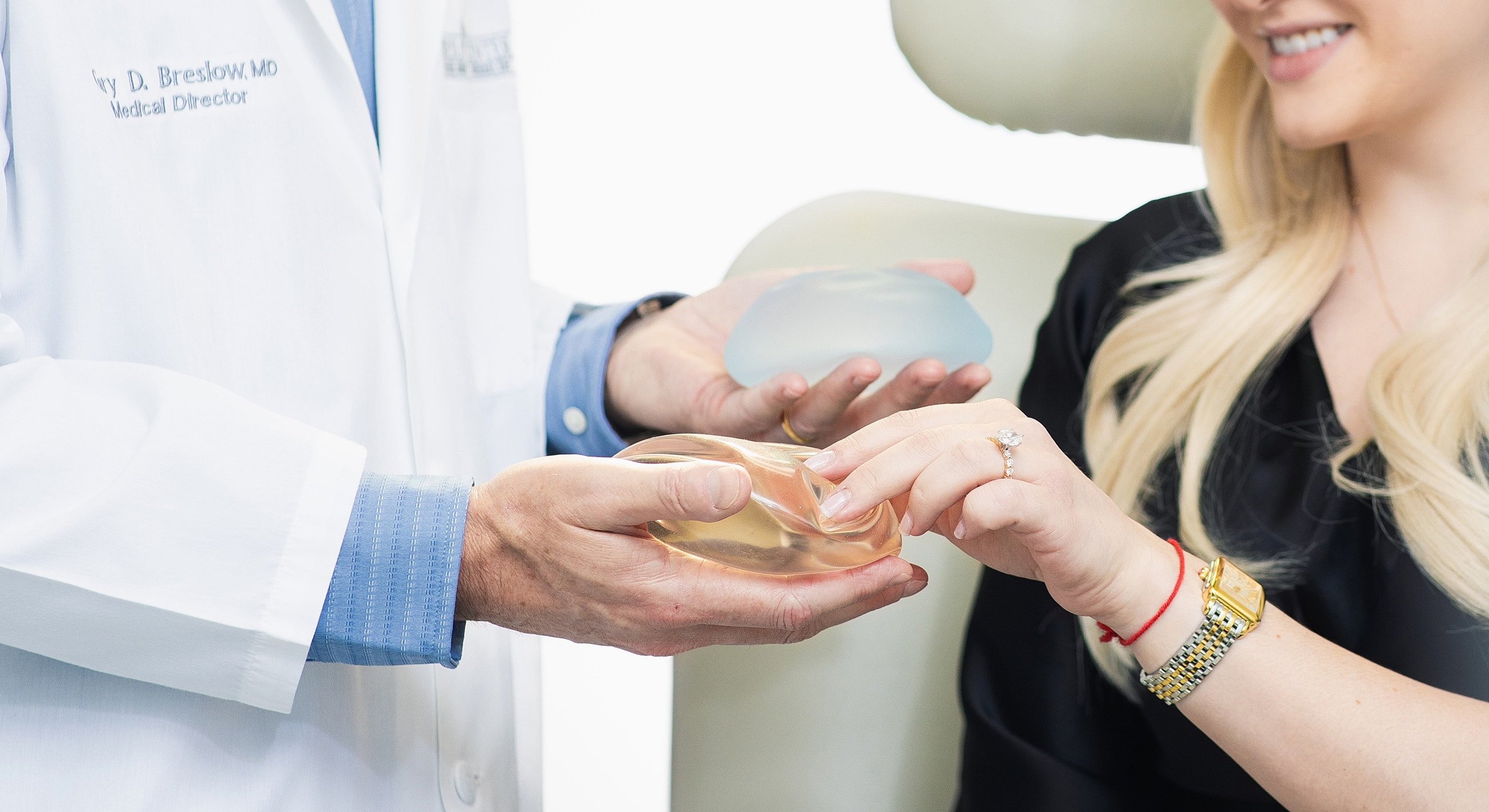 Consultation about breast implant options with doctor.