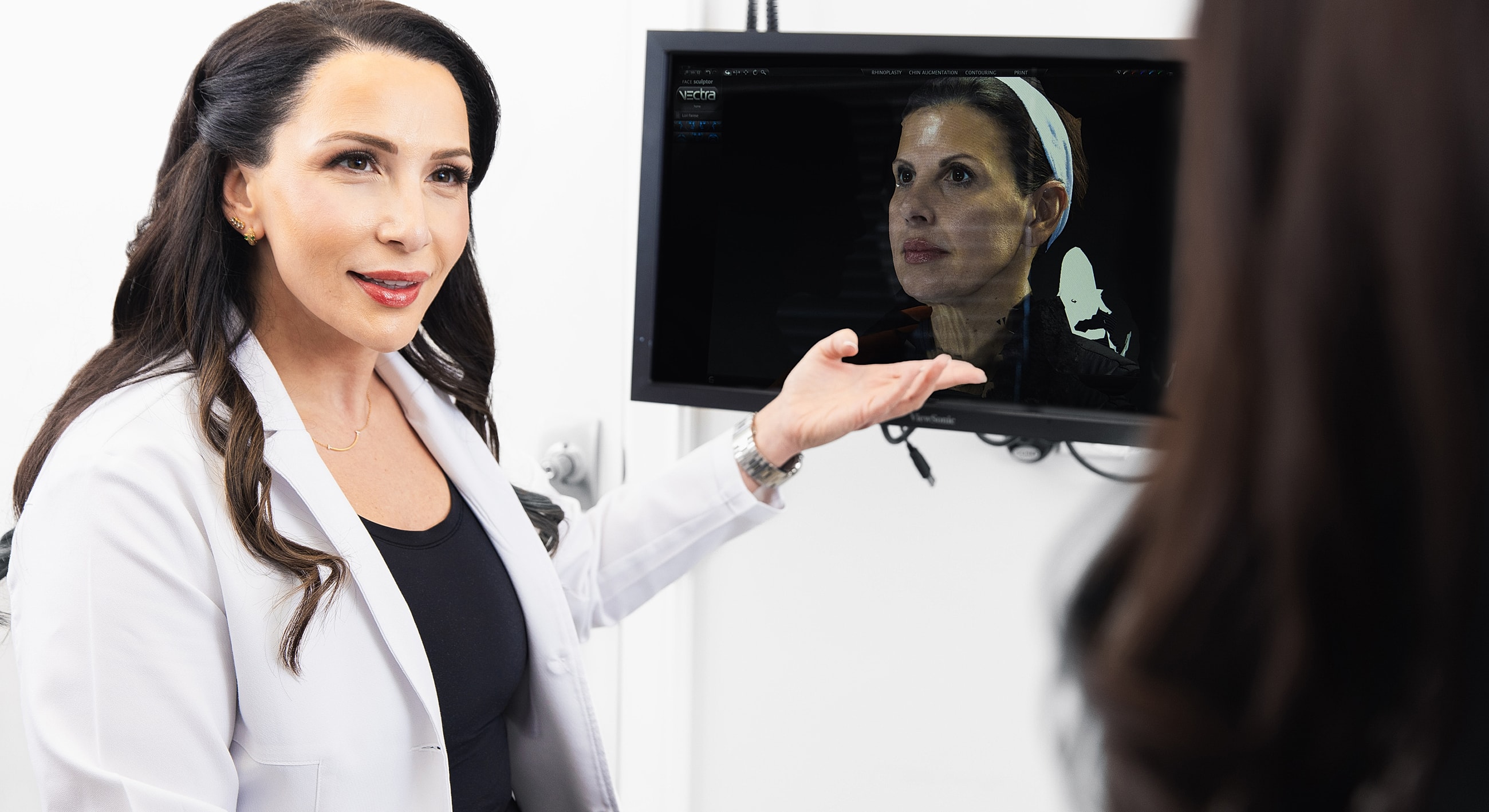 Medical professional discussing patient imaging results.