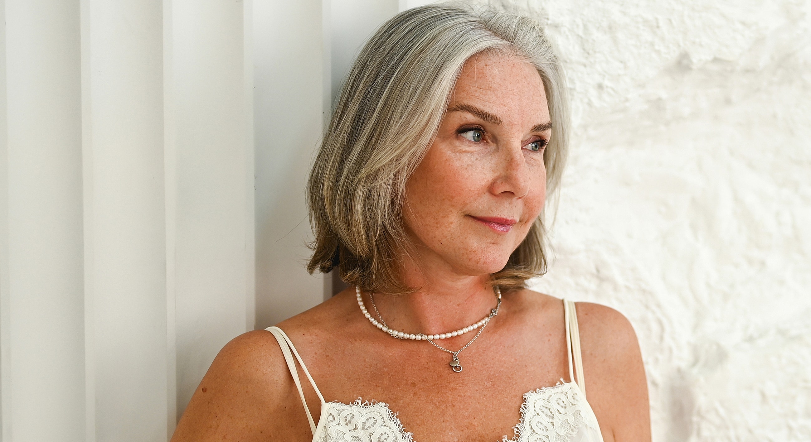 Portrait of a woman with gray hair.